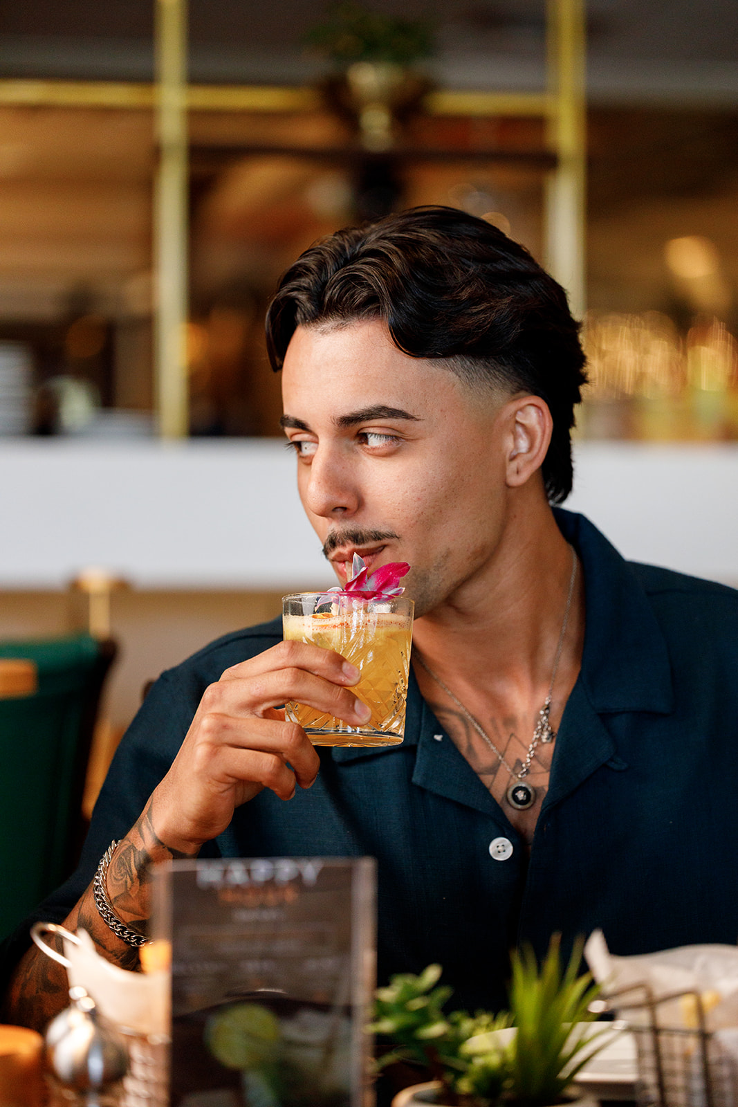 Guest enjoying a cocktail at the best Brazilian steakhouse in Deerfield Beach, FL