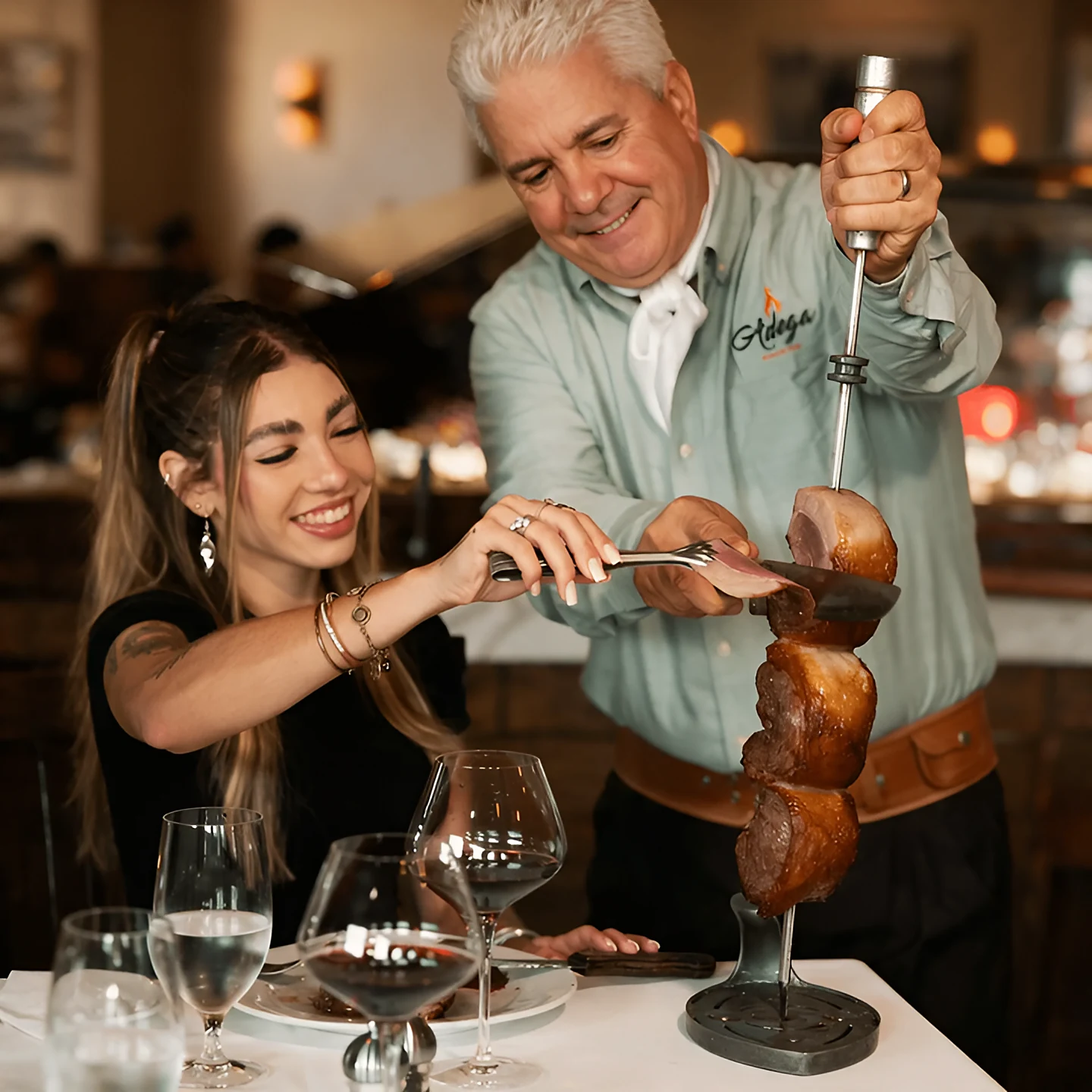 A gaucho carving picanha tableside