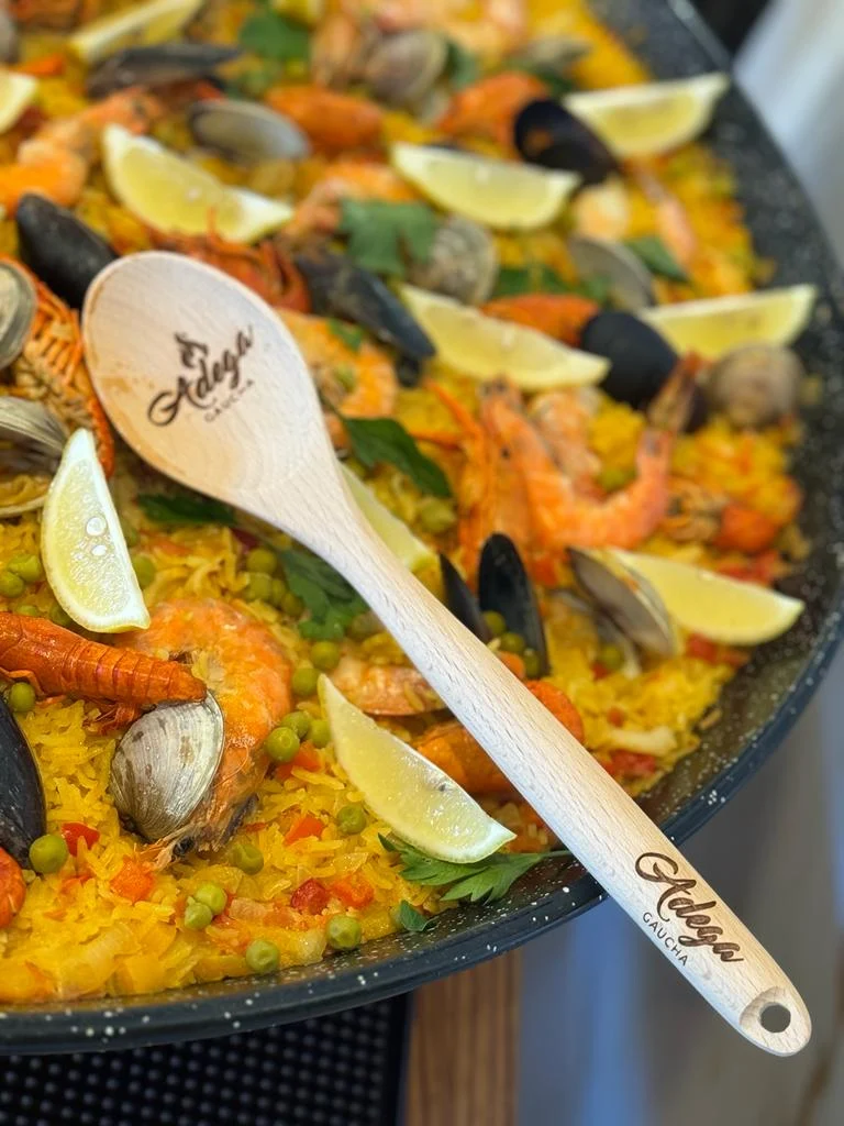 Seafood paella with saffron rice at Adega Gaucha